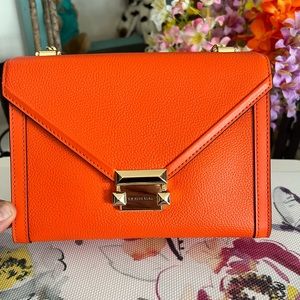 BNWT Michael Kors bright orange bag.